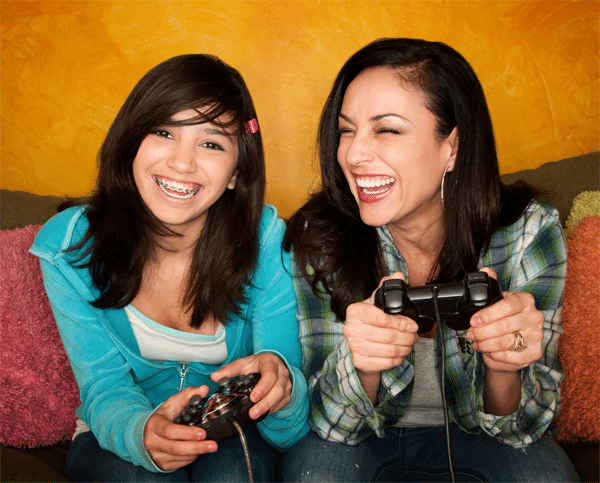 mother-and-daughter-playing-video-games